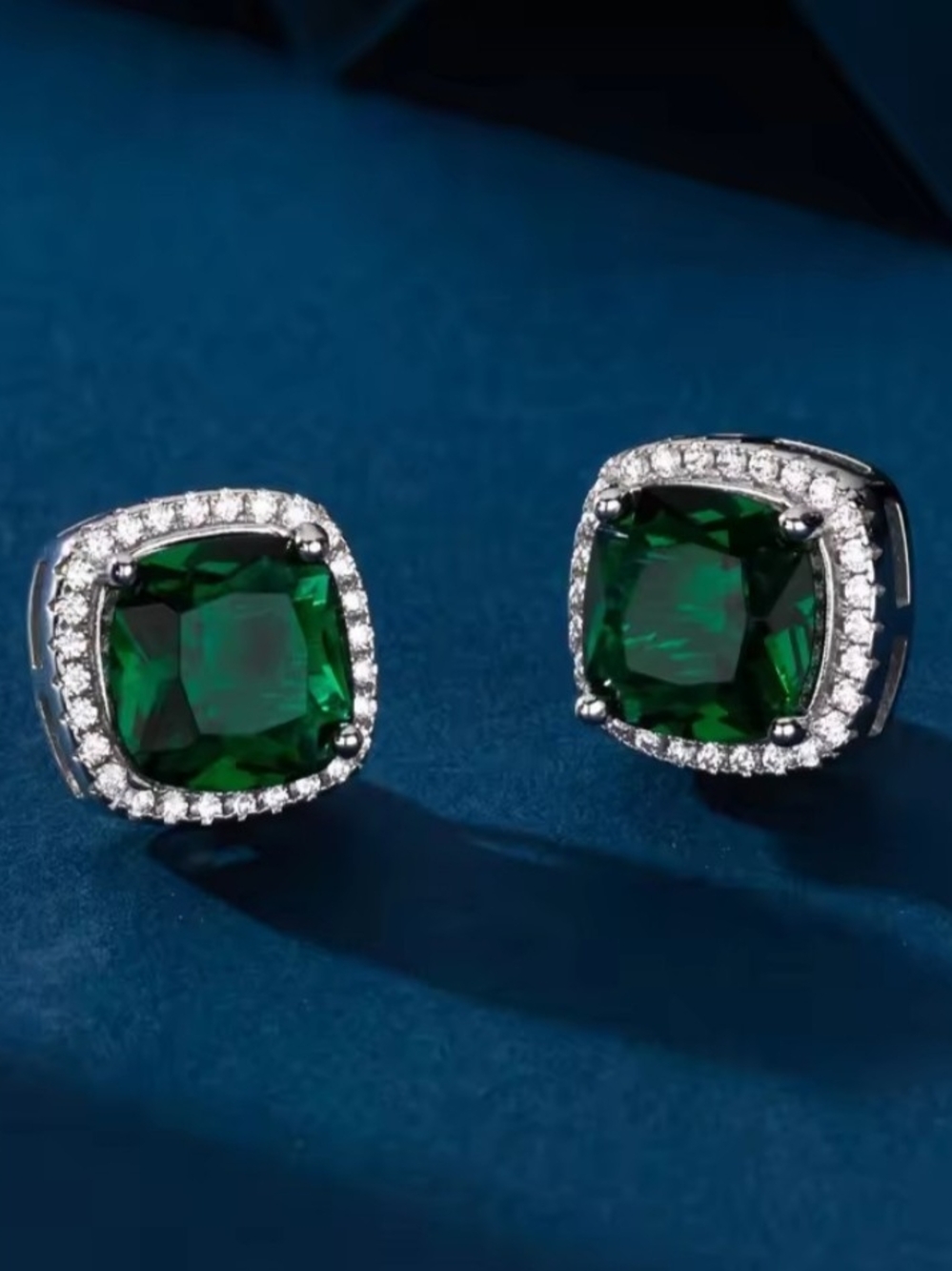 White Rhodium Emerald Green Cushion Halo Stud Earrings